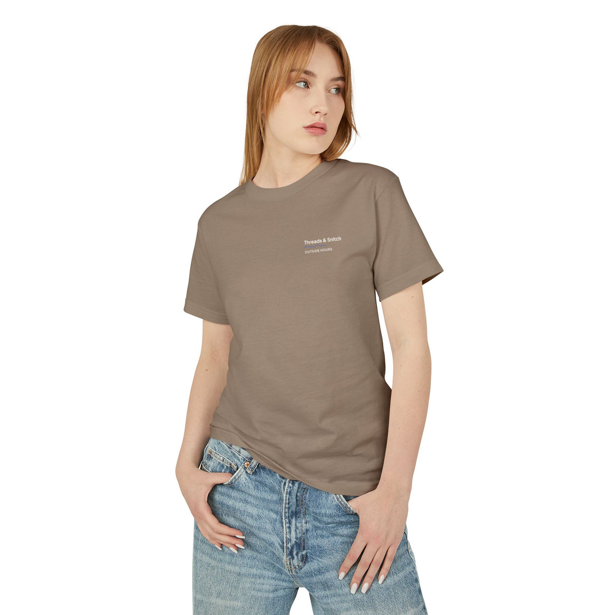Front-view model mockup of Shore Study Bird Graphic Tee in Faded Brown, showing the small left-chest signature.