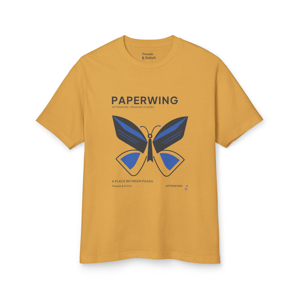 Mockup of Paperwing Bookish Moth Tee in Faded Mustard, front view showing moth formed from folded-paper wings and a bookmark-like body.