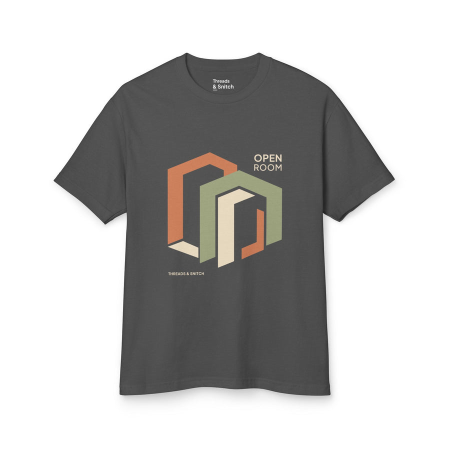 Mockup of Open Room Architectural Graphic Tee in Faded Black, front view showing overlapping open doorway shapes with Open Room lettering.