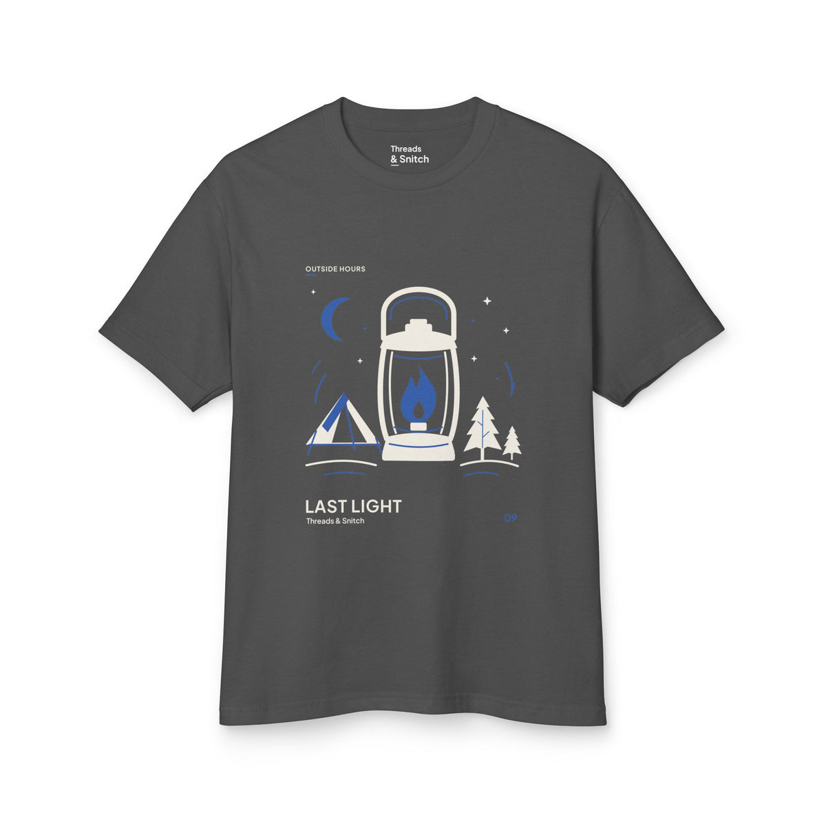 Mockup of Last Light Lantern Graphic Tee in Faded Black, front view showing lantern, tent, trees and blue crescent moon.