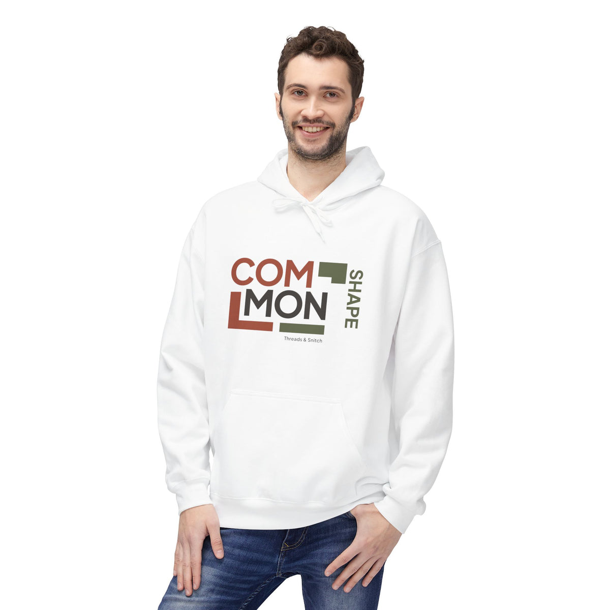 Model mockup of Common Shape Typography Hoodie in White, front view showing stacked Common lettering, vertical Shape lettering and stepped blocks.
