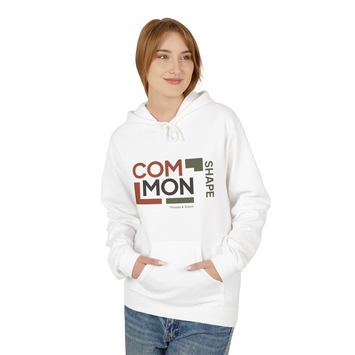 Model mockup of Common Shape Typography Hoodie in White, front view showing stacked Common lettering, vertical Shape lettering and stepped blocks.
