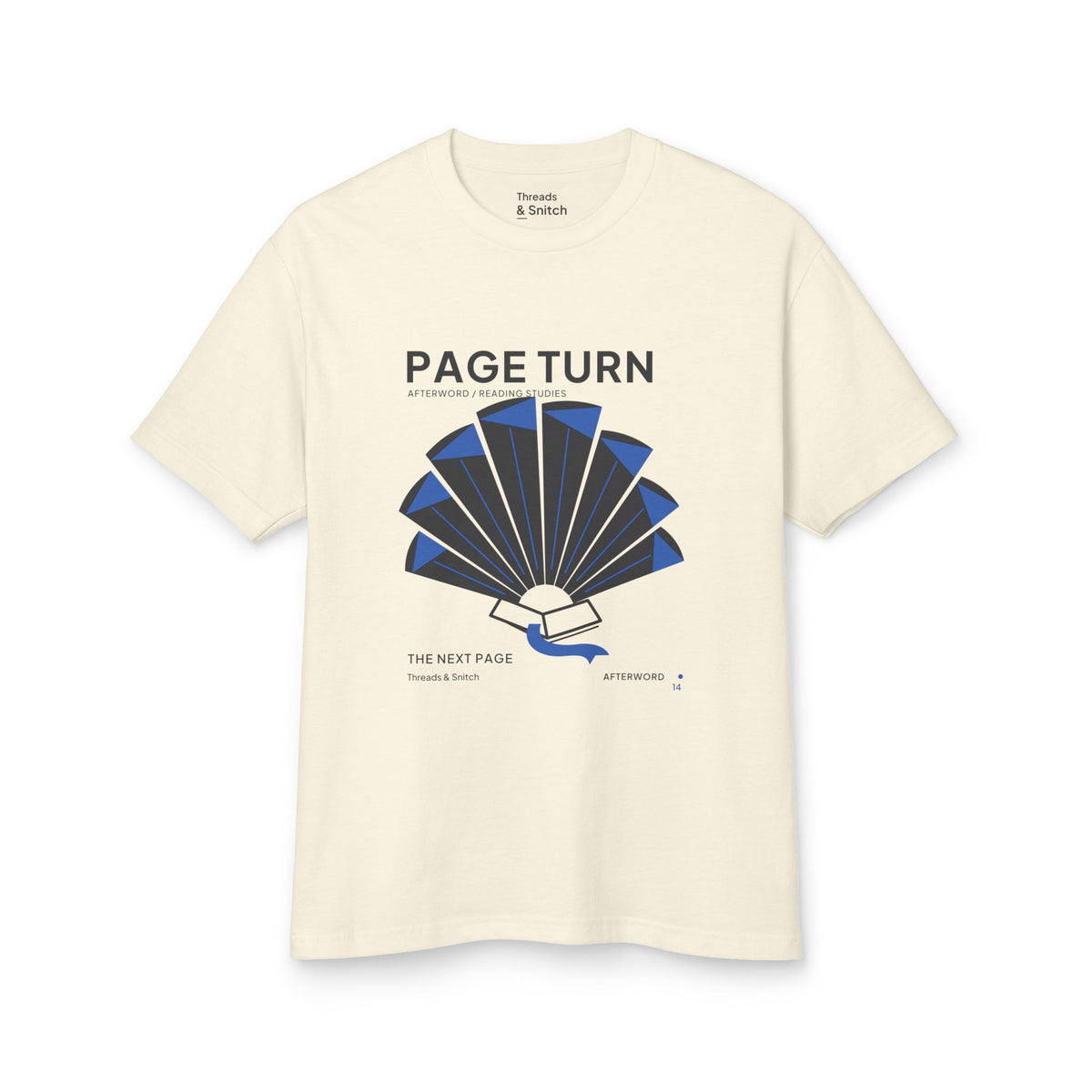 Mockup of Page Turn Book Graphic Tee in Faded Cream, front view showing book pages fanned into a radial shape with blue folds and bookmark.