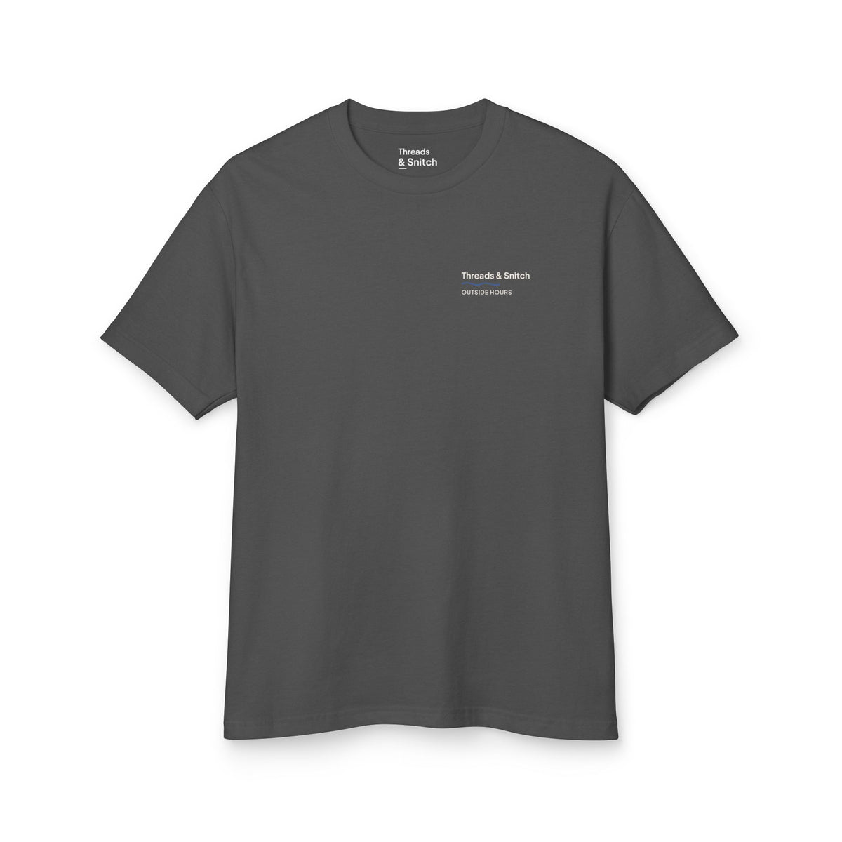 Mockup of Shore Study Bird Graphic Tee in Faded Black, front view showing a small left-chest signature.