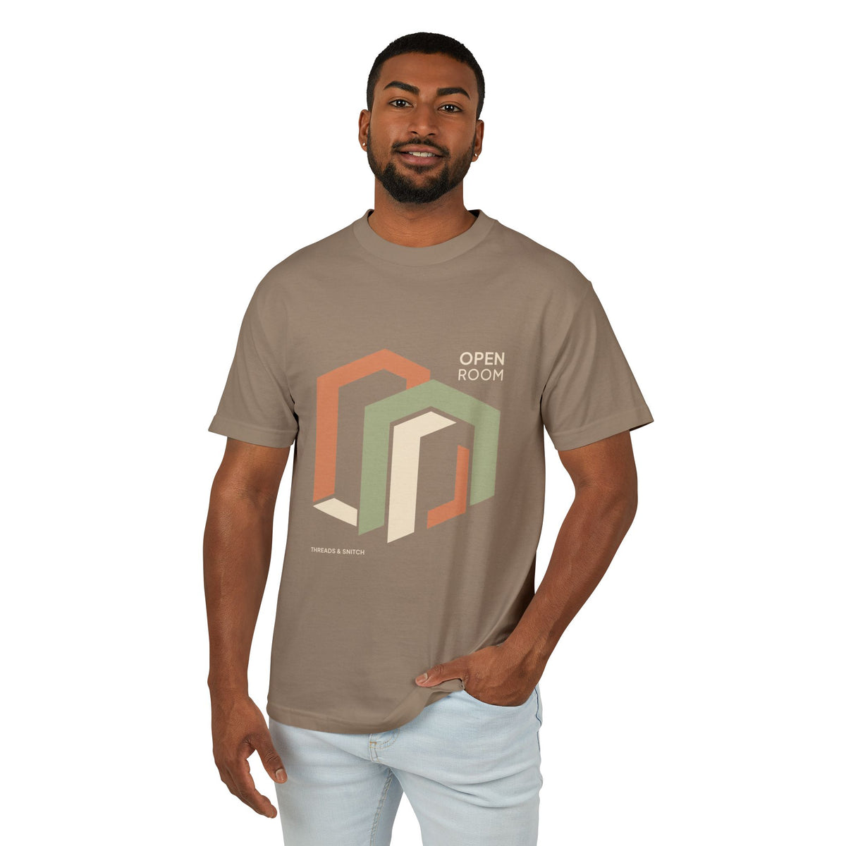 Model mockup of Open Room Architectural Graphic Tee in Faded Brown, front view showing overlapping open doorway shapes with Open Room lettering.