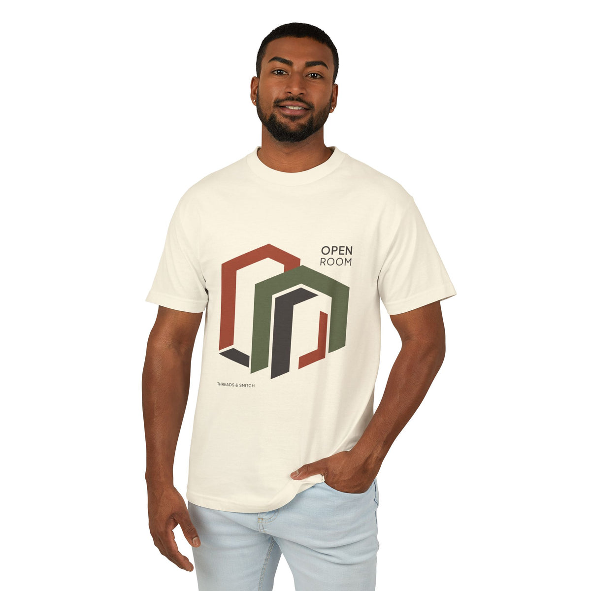 Model mockup of Open Room Architectural Graphic Tee in Faded Cream, front view showing overlapping open doorway shapes with Open Room lettering.