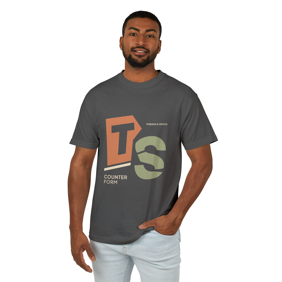 Model mockup of Counterform Abstract Letter Graphic Tee in Faded Black, front view showing abstract T and S letterforms with Counterform lettering.