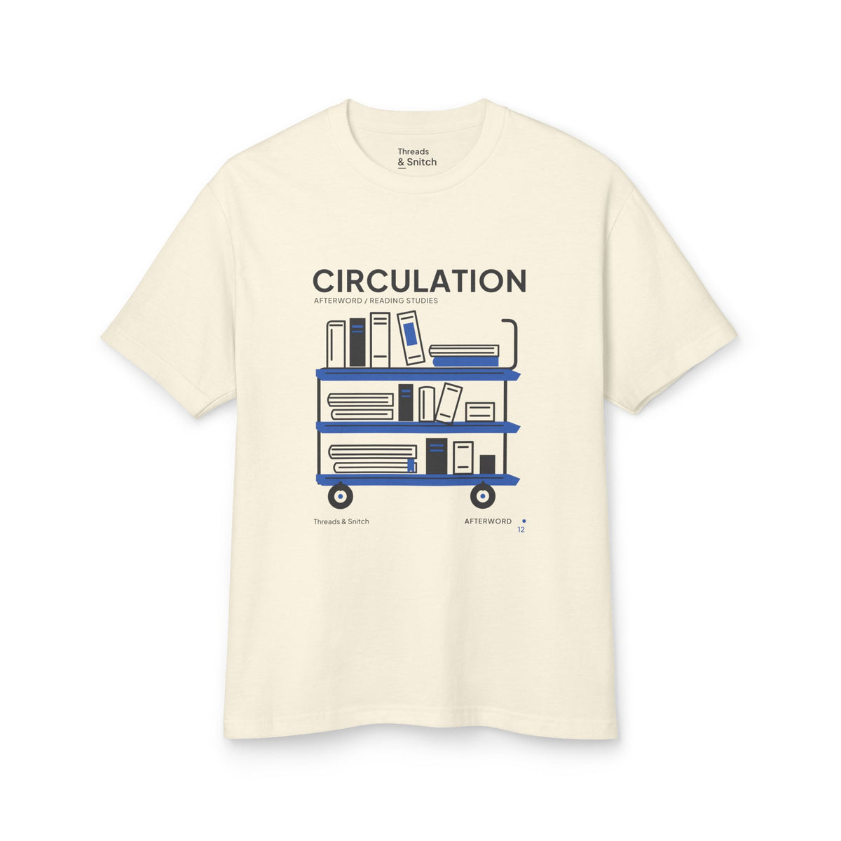 Mockup of Circulation Library Cart Tee in Faded Cream, front view showing three-tier library cart filled with books and blue shelves.