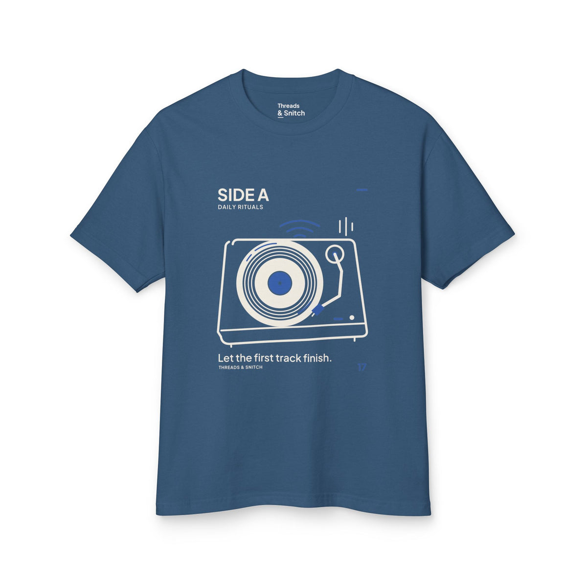 Mockup of Side A Record Player Tee in Faded Navy, front view showing record player with open circular grooves, tonearm and blue sound marks.