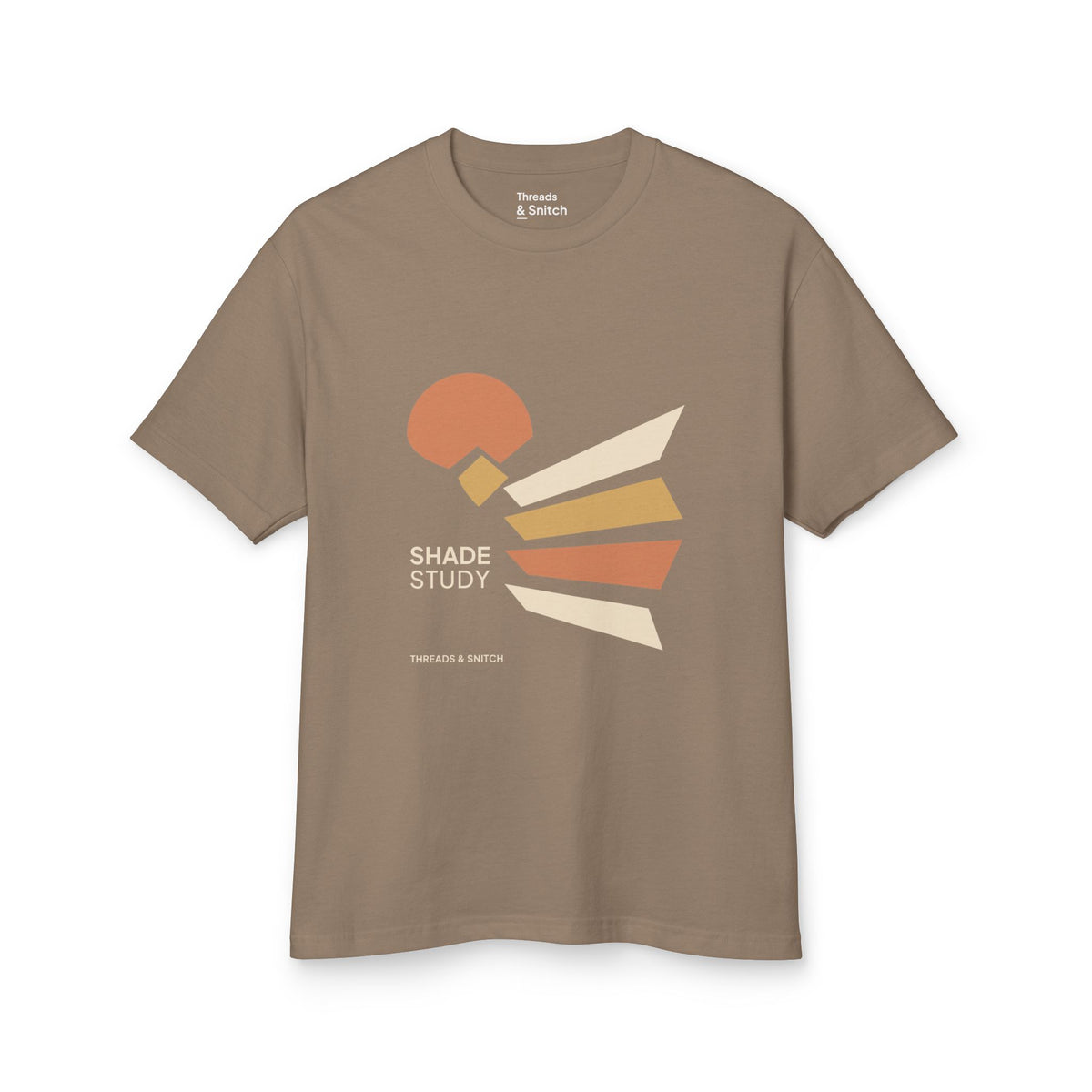Mockup of Shade Study Geometric Graphic Tee in Faded Brown, front view showing a cut circular shape and radiating angular planes with Shade Study lettering.