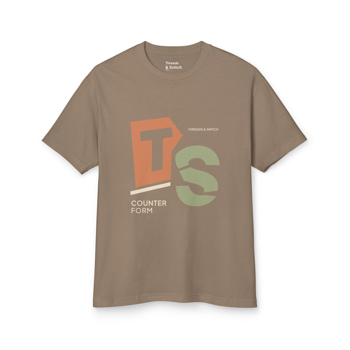 Mockup of Counterform Abstract Letter Graphic Tee in Faded Brown, front view showing abstract T and S letterforms with Counterform lettering.