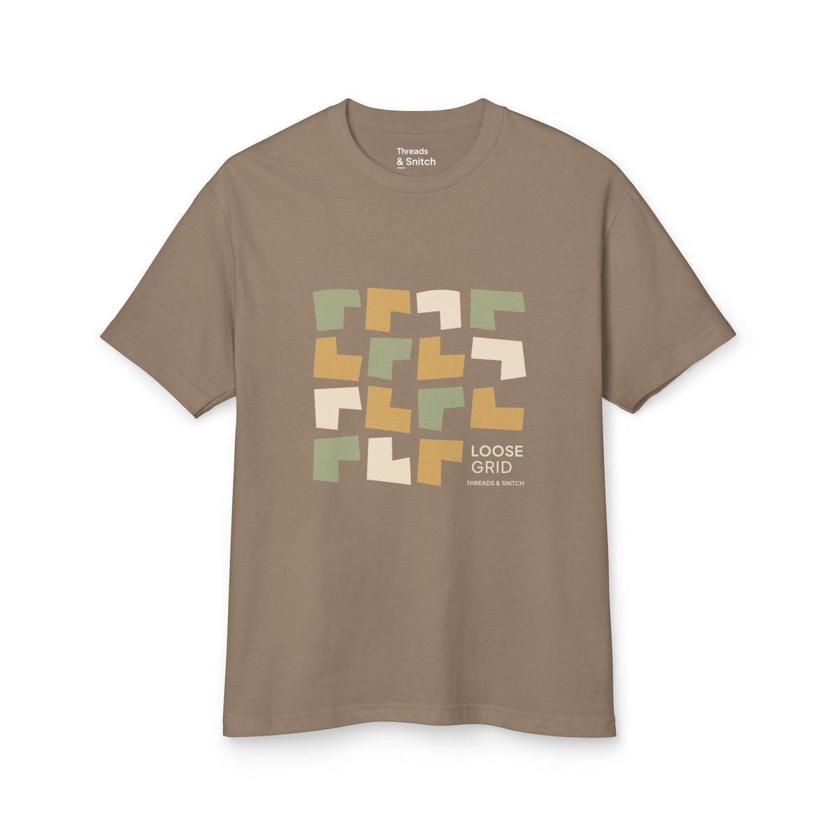 Mockup of Loose Grid Pattern Graphic Tee in Faded Brown, front view showing an irregular grid of open-cut geometric tiles with Loose Grid lettering.
