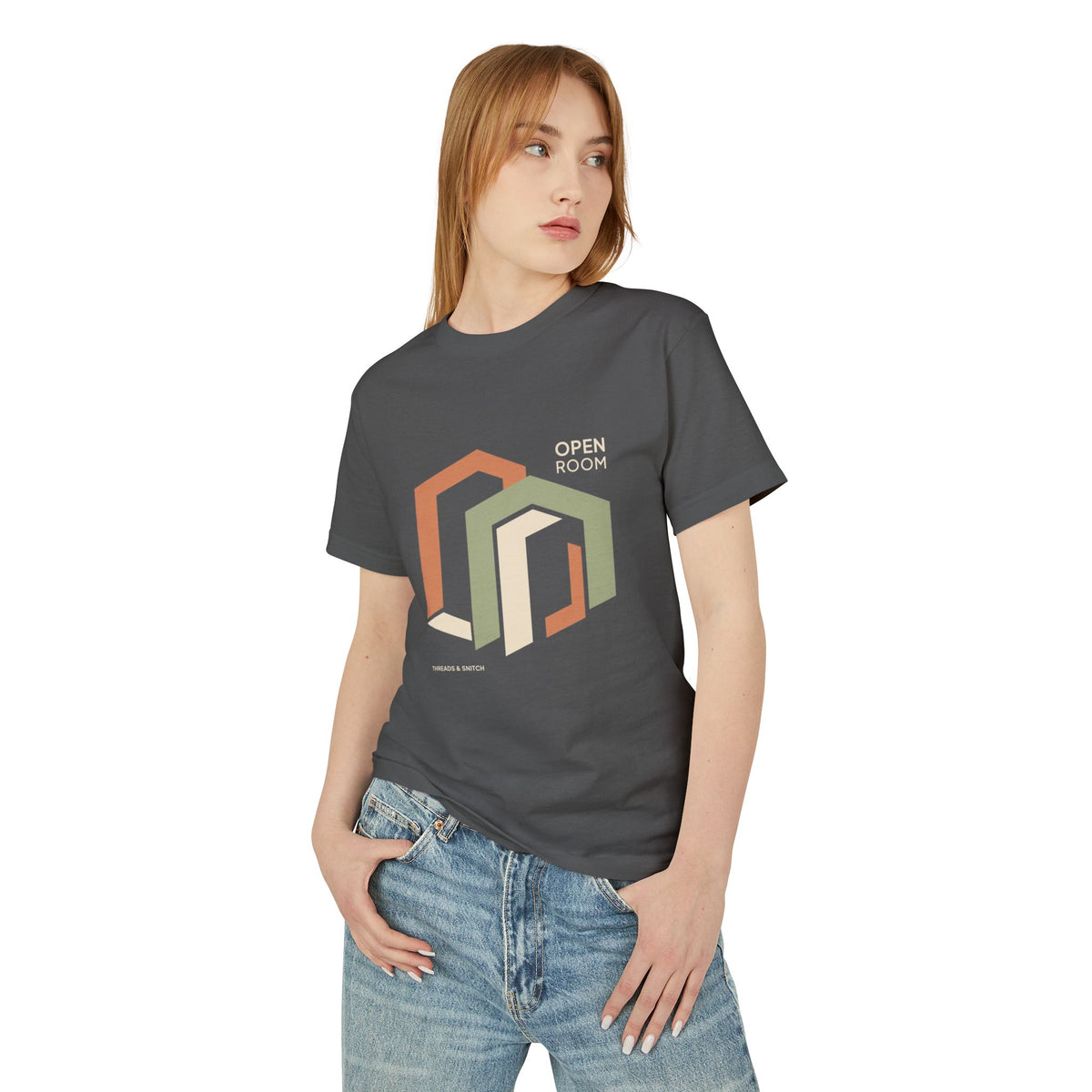 Model mockup of Open Room Architectural Graphic Tee in Faded Black, front view showing overlapping open doorway shapes with Open Room lettering.